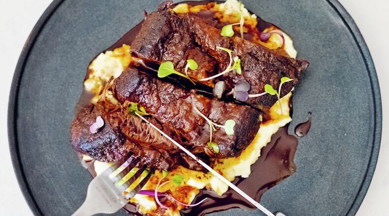 American comfort food plus Korean flair result in Korean Braised Short Ribs, shown with Wasabi Mashed Potatoes. Reprinted with permission from “The Peached Tortilla” © 2019 Eric Silverstein. Published by Sterling Epicure. CONTRIBUTED BY CARLI RENE / INKED FINGERS
