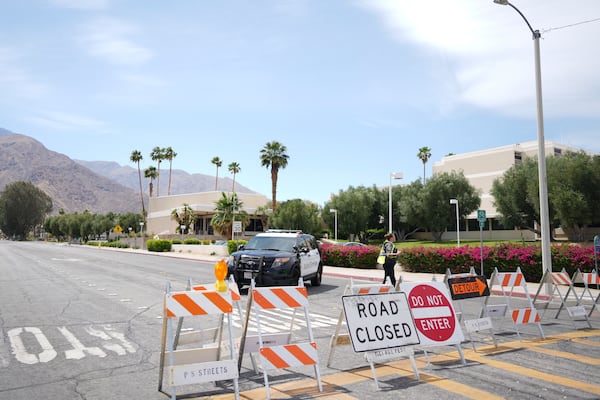 A road is closed near the site of an explosion Saturday, May 17, 2025, in Palm Springs, Calif. (AP Photo/Eric Thayer)