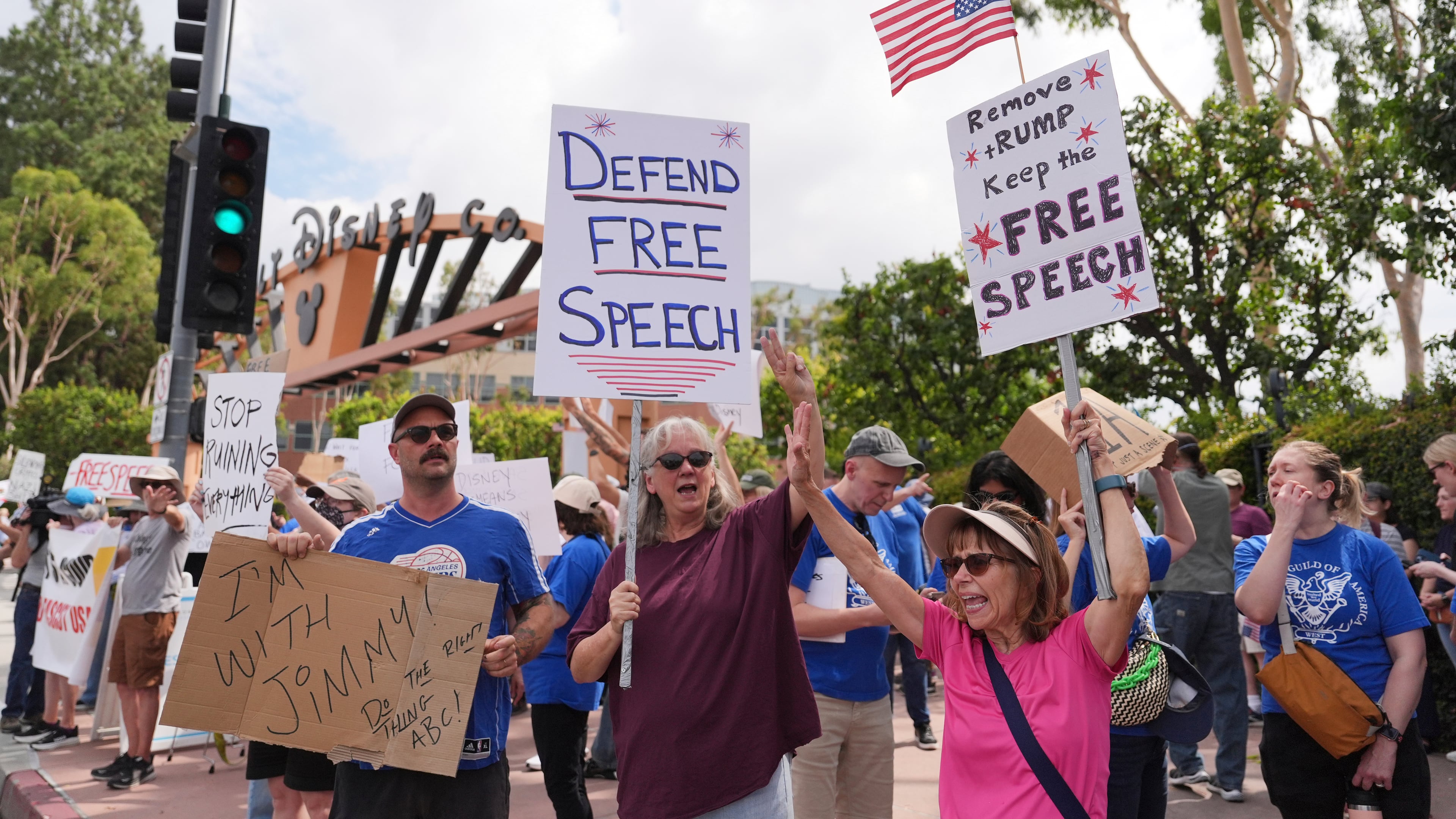 Demonstrators picket in response to the cancellation of Jimmy Kimmel's late-night show outside of The Walt Disney Studios Thursday, Sept. 18, 2025, in Burbank, Calif. (AP Photo/Jae C. Hong)