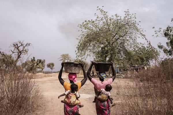 Women work at a gold mining site in the Kedougou region of Senegal on Thursday, Jan. 16, 2025. (AP Photo/Annika Hammerschlag)