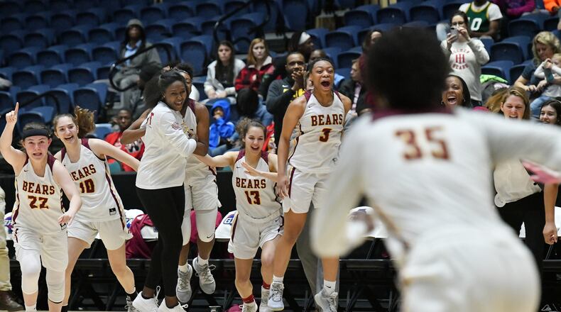 Holy Innocents players celebrate as they defeat St. Francis. (Hyosub Shin / Hyosub.Shin@ajc.com)