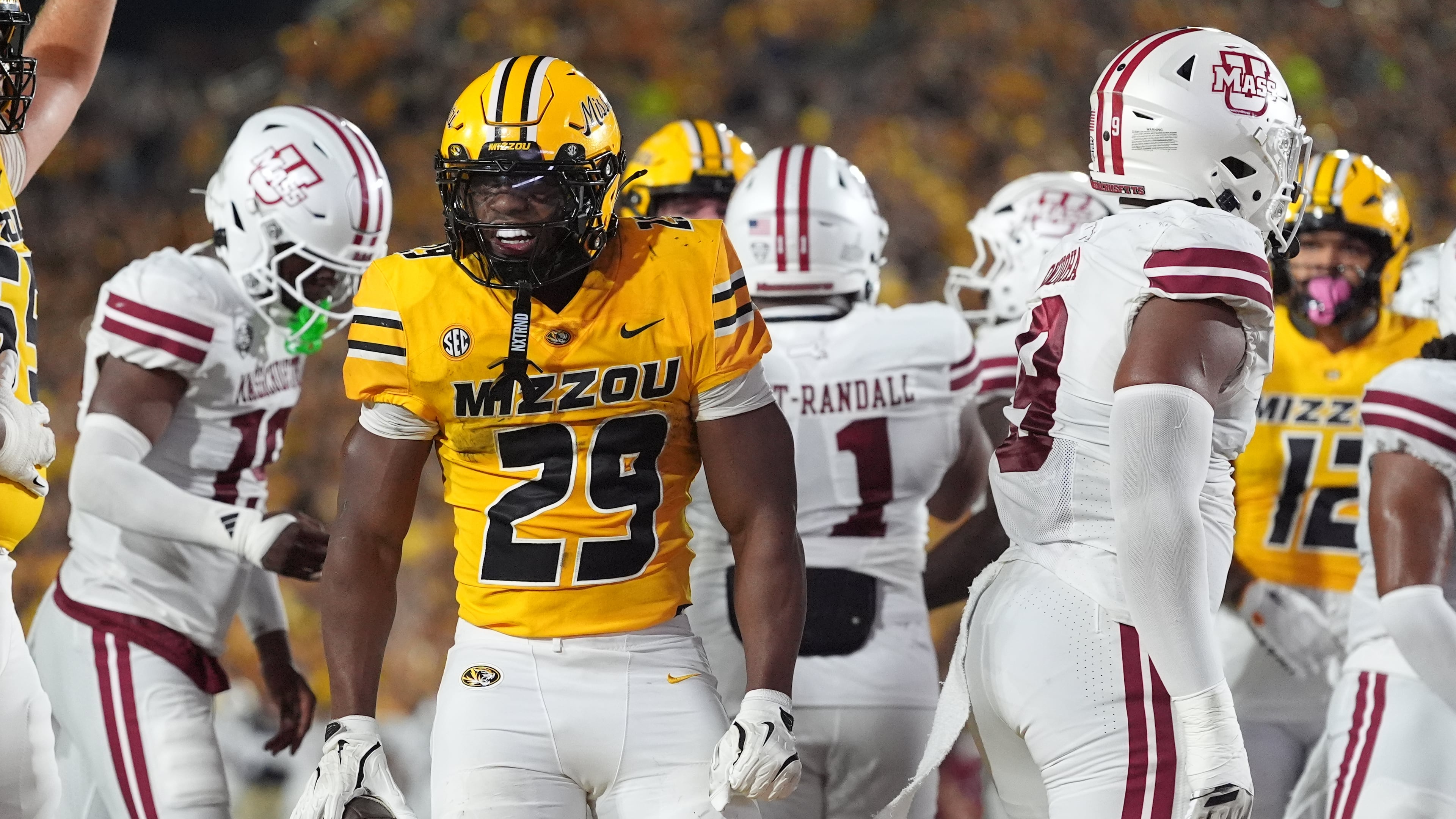 Missouri running back Ahmad Hardy (29) celebrates after scoring during the first half of an NCAA college football game against Massachusetts Saturday, Sept. 27, 2025, in Columbia, Mo. (AP Photo/Jeff Roberson)