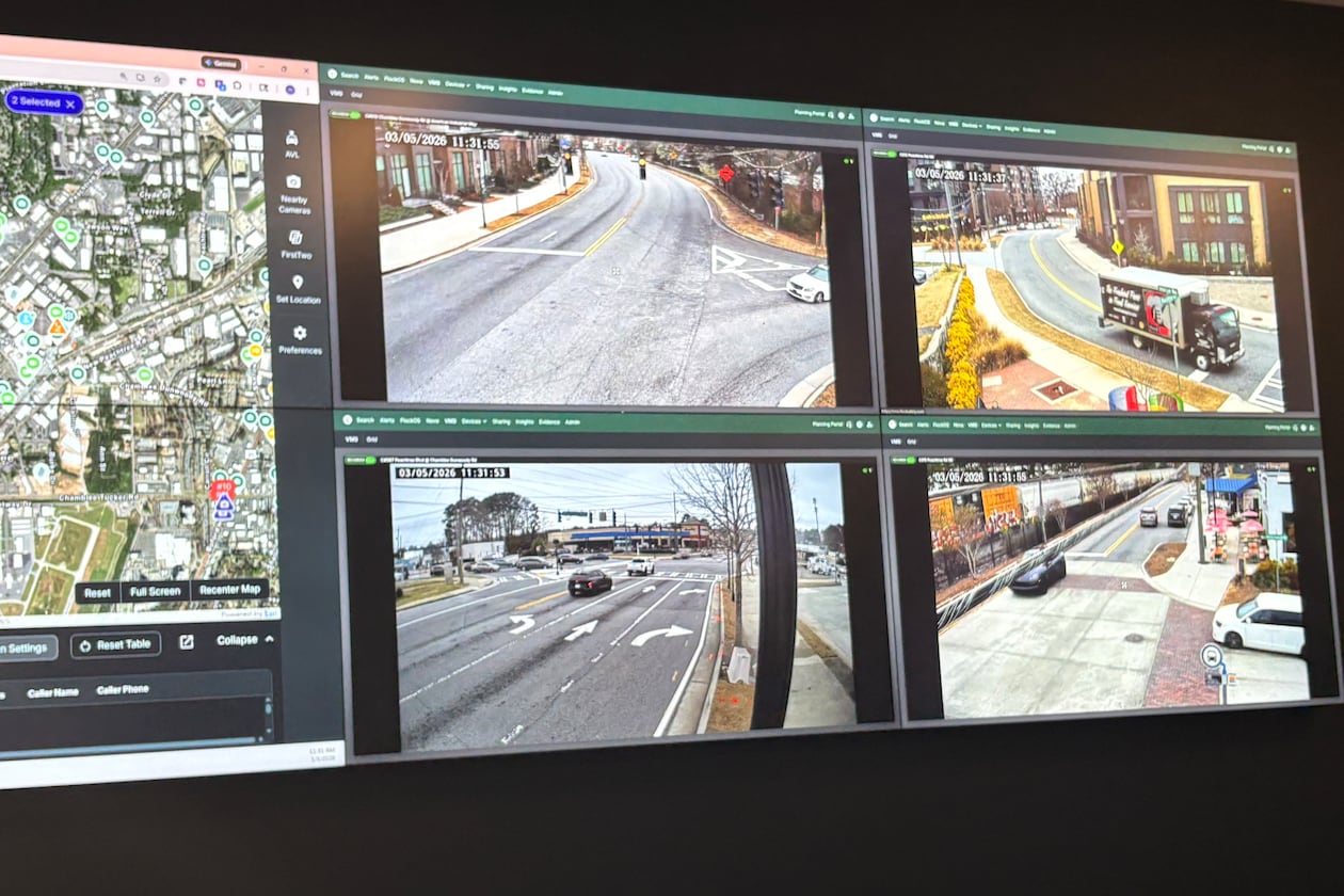 Monitors inside Chamblee's Real Time Crime Center show live camera feeds from parks and intersections across the city. (Shaddi Abusaid/AJC)