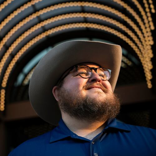Giles Sims, who is getting a 90-hour bachelor of applied science in communication from Ensign College poses for a portrait on campus in Salt Lake City, Utah Thursday, Aug. 6, 2026, in Salt Lake City. (AP Photo/Marielle Scott)