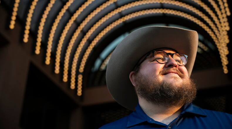 Giles Sims, who is getting a 90-hour bachelor of applied science in communication from Ensign College poses for a portrait on campus in Salt Lake City, Utah Thursday, Aug. 6, 2026, in Salt Lake City. (AP Photo/Marielle Scott)