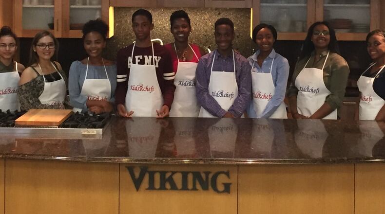 On the set of the Kids-R-Chefs talk and cooking show are, from left, Joelle Scott, Daniela Lopez, Kortney Avery, Jana Davis, Julian Harris, Dr. Monica Reckley, Isom Hewitt, Arianna Watson, Kaelyn Fraier, Sydney Thompson, and Sydnni-Jade Adams.