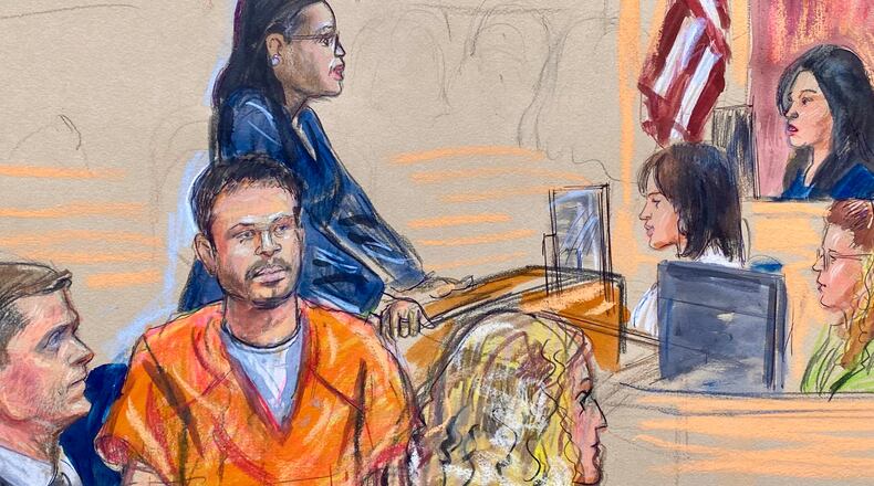 This courtroom sketch depicts Cole Tomas Allen, seated center, the California man arrested in the shooting incident at the correspondents dinner in Washington, seen appearing before U.S. Magistrate Moxila Upadhyaya, in federal court, Thursday, April 30, 2026 in Washington. (Dana Verkouteren via AP)