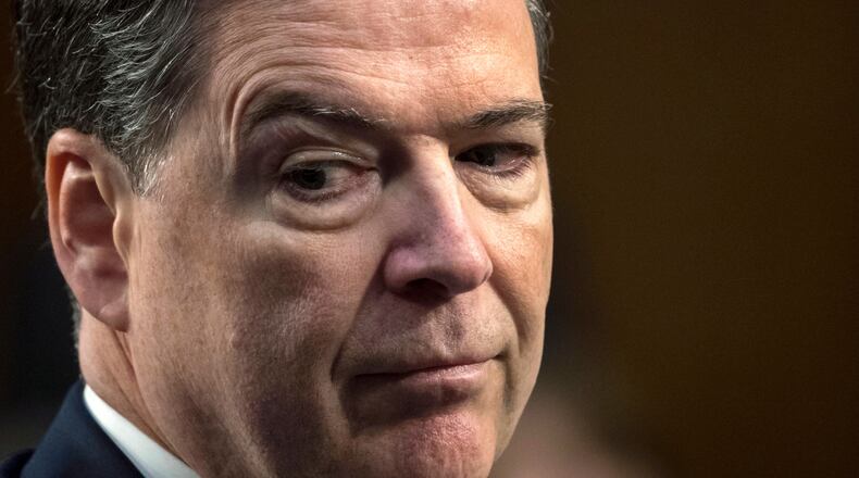 FILE - Former FBI Director James Comey testifies before the Senate Select Committee on Intelligence, on Capitol Hill in Washington, June 8, 2017. (AP Photo/J. Scott Applewhite, File)