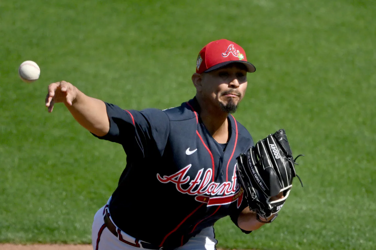 Atlanta Braves pitcher Carlos Carrasco throws a live batting practice session during the first full-squad spring training workouts at CoolToday Park, Sunday, Feb. 15, 2026, in North Port, Fla. (Hyosub Shin/AJC)
