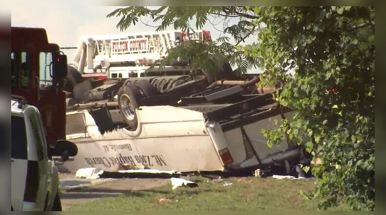 One person was killed and dozens of others were injured after an Alabama church bus carrying a youth group crashed into a black sedan on June 8 in South Fulton. (Credit: Channel 2 Action News)