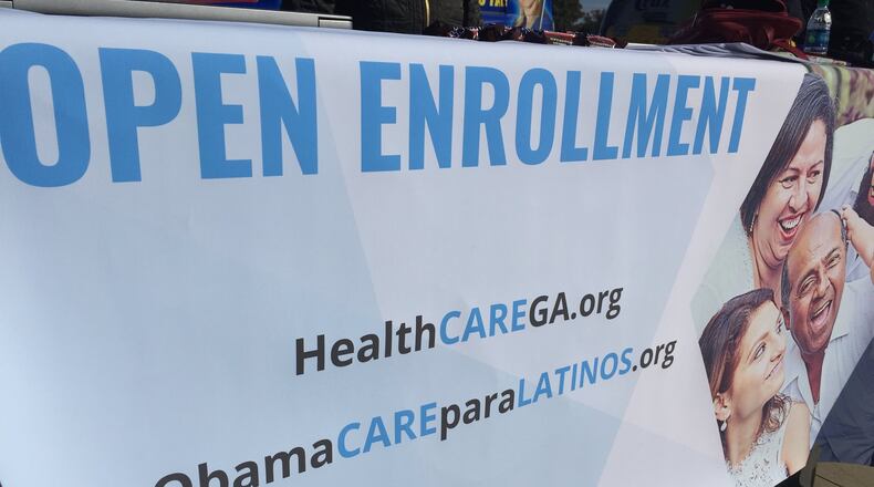 An information table hosted by Georgia’s 2018 Obamacare navigator, Georgia Refugee Health and Mental Health. Open enrollment for the Affordable Care Act, also known as Obamacare, began Nov. 1 in Georgia and closes Dec. 15, unless the state gets an extension. Enrollment in Georgia has been lagging behind last year, which also lagged behind 2016. (PHOTO by ARIEL HART / ahart@ajc.com)