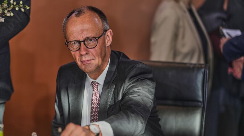German Chancellor Friedrich Merz arrives for the cabinet meeting at the Chancellery in Berlin, Germany, Wednesday, Nov. 12, 2025. (AP Photo/Markus Schreiber)