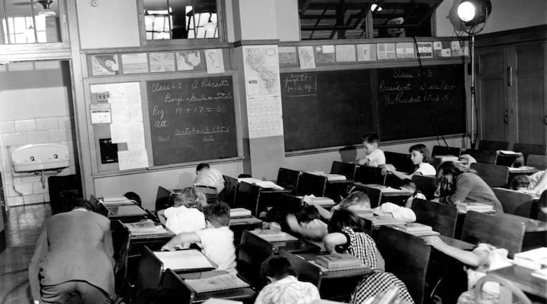 A UGA professor says he was one of those kids in the grainy black-and-white “duck and cover” films, hiding under his school desk to secure his safety from an atomic bomb blast.