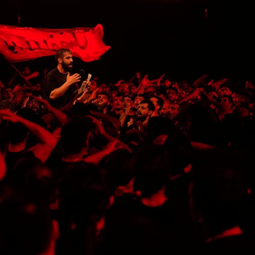 Iranian mourners beat their heads and chests during a ceremony in Tehran, Iran, Tuesday, June 23, 2026, prior to Ashoura, which commemorates the 7th-century martyrdom of Imam Hussein, one of Prophet Muhammad's grandsons and one of Shiite Islam's most beloved saints, and 72 of his companions, who were killed in a battle in Karbala in present-day Iraq. (AP Photo/Vahid Salemi)