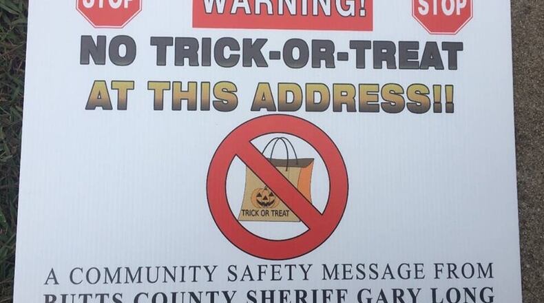 Butts County deputies placed this sign at the homes of registered sex offenders ahead of Halloween last year. Three men are suing to stop the Sheriff’s Office from deploying the signs this year.