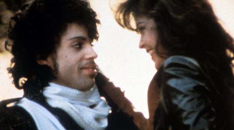 Prince embraces Apollonia Kotero in a scene from the film "Purple Rain." (Photo by Warner Brothers/Getty Images)