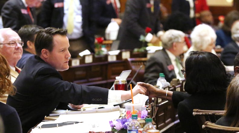 3/7/19 - Atlanta  - Scott Holcomb, representative of district 81, is congratulated after HB 282 passes at the Georgia State Capitol in Atlanta, Georgia on Thursday, March 7, 2019. EMILY HANEY / emily.haney@ajc.com
