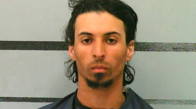 Trevor Marquis Rowe is accused of stuffing his girlfriend's 10-month-old daughter into a backpack and leaving her in a car trunk for five hours. He was charged Wednesday with capital murder.