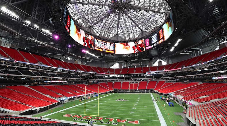 The roof of Mercedes-Benz Stadium is shown in the closed position.