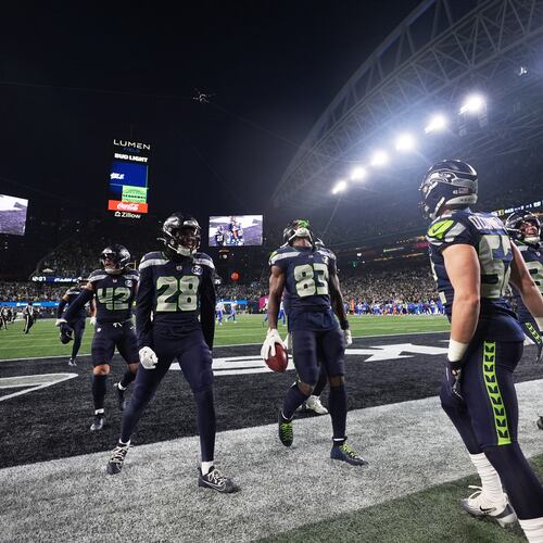 Seattle Seahawks' Dareke Young (83) celebrates after recovering a fumble by Los Angeles Rams wide receiver Xavier Smith during a punt return during the second half of the NFC Championship NFL football game Sunday, Jan. 25, 2026, in Seattle. (AP Photo/Lindsey Wasson)