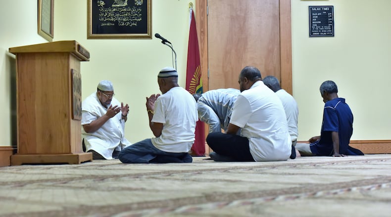 Muslims at prayer in Atlanta in a 2016 AJC file photo. HYOSUB SHIN / HSHIN@AJC.COM