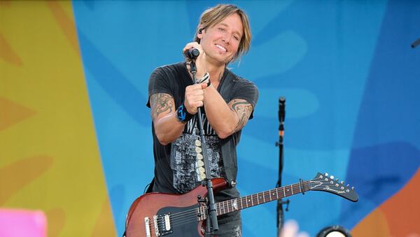 Country music artist Keith Urban is pictured during  a performance. He’s been  nominated for five CMA Awards this years, more than anyone except Miranda Lambert and Little Big Town.