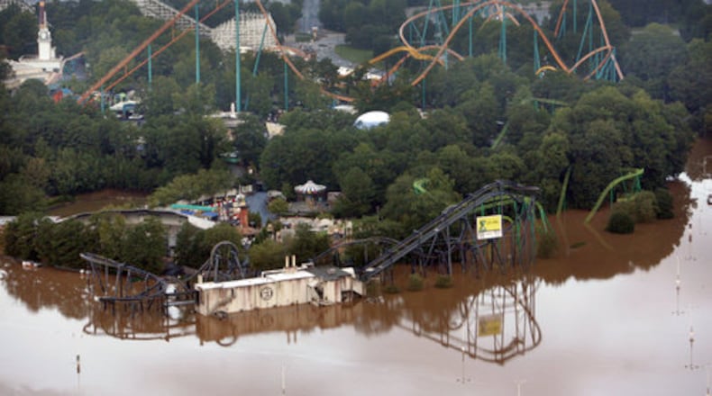 Flood waters from Sweetwater Creek cover Six Flags and one of its massive parking lots.