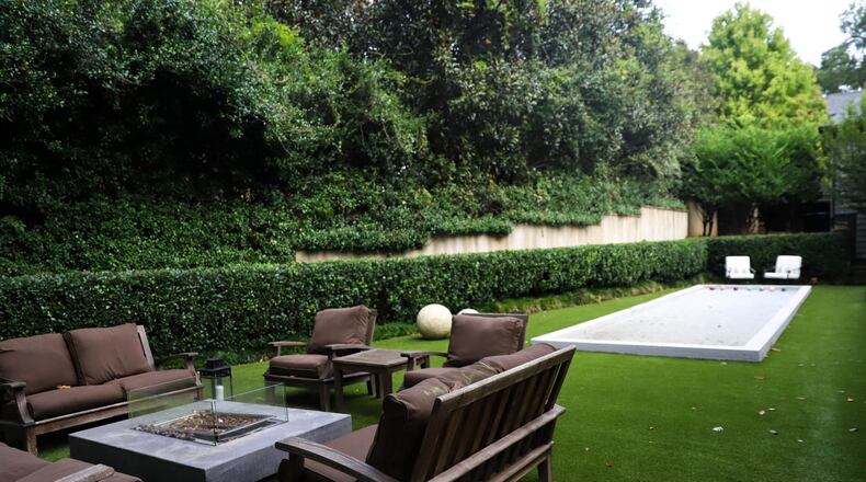 Angelo and Dana Spinola’s family loves to play bocce, so Dana worked with Green Seasons Landscaping, who does their usual landscaping, to put in a bocce court as a surprise for Angelo for Valentine’s Day. Text by Shannon Dominy. Photo by Reynolds Rogers.
