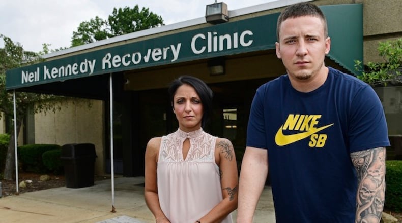 Niki Campana, left, and Paul Wright stand together outside the Neil Kennedy Recovery Clinic, Thursday, June 15, 2017, in Youngstown, Ohio. Republican efforts to roll back âObamacareâ are colliding with the opioid epidemic. Cutbacks would hit hard in states that are deeply affected by the addiction crisis and struggling to turn the corner. The issue is Medicaid, expanded under former President Barack Obama. Data shows that Medicaid expansion is paying for a large share of treatment costs in hard hit states. (AP Photo/David Dermer)