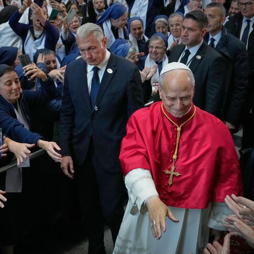 Pope Leo XIV is greeted as he arrives to meet with bishops, priests, consecrated persons and pastoral workers at the Catholic basilica of Harissa, Lebanon Monday, Dec. 1, 2025. (AP Photo/Hussein Malla)