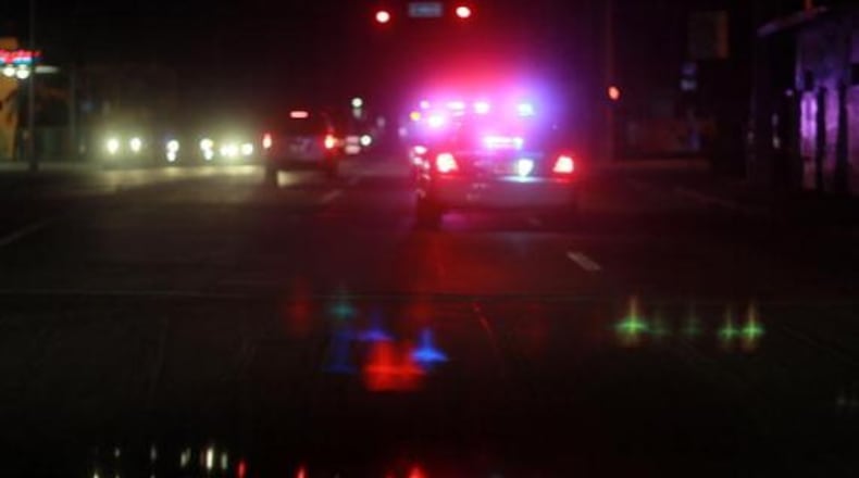 MIAMI - AUGUST 11: A City of Miami police car with lights ablaze responds to a call as they patrol the street on August 11, 2010 in Miami, Florida. The Miami Police Department launched "Operation Take Back Our Streets" yesterday in response to recent shootings in the Model City and Little Haiti communities of Miami. The city has seen a number of shootings recently using high powered assault weapons. (Photo by Joe Raedle/Getty Images)