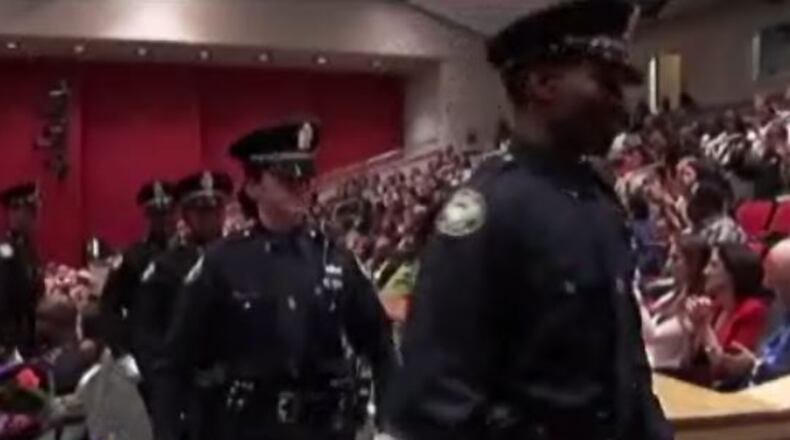 Atlanta police recruits leave a ceremony. (Credit: Channel 2 Action News)