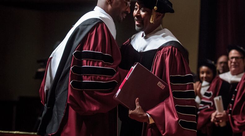 Morehouse College Interim President Bill Taggart (R) talks with commencement speaker Van Jones (L) during the Morehouse College graduation ceremony in the Martin Luther King JR. International Chapel on The Morehouse Campus Sunday, May 21, 2017. STEVE SCHAEFER / SPECIAL TO THE AJC
