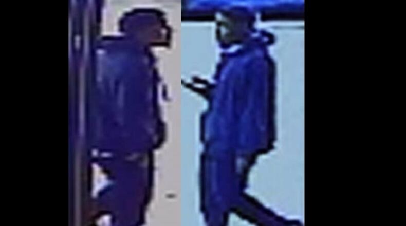 Gwinnett County police are searching for two men who allegedly robbed a cashier and a customer at a luggage store.