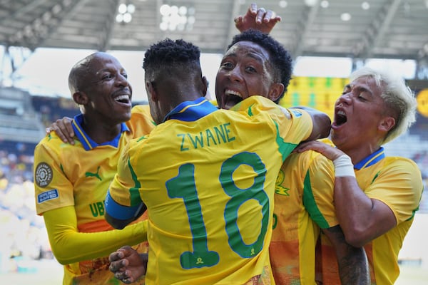 Mamelodi Sundowns celebrate after scoring opening goal during the Club World Cup Group F soccer match between Mamelodi Sundowns and Borussia Dortmund in Cincinnati, Saturday, June 21, 2025. (AP Photo/Jeff Dean)