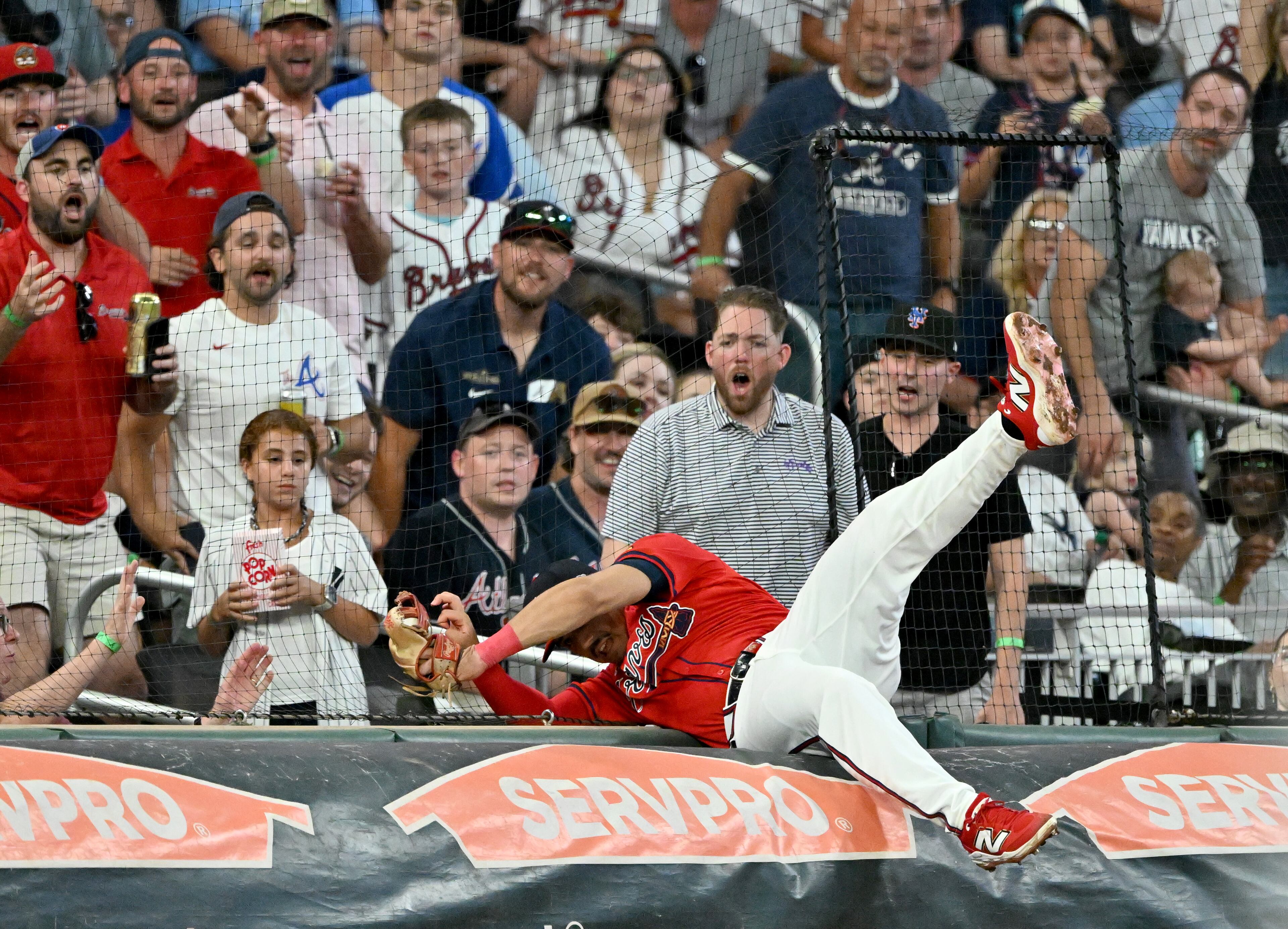 Braves shortstop Nacho Alvarez Jr. catches a fly-ball by New York Yankees catcher Austin Wells during the ninth inning at Truist Park on Friday, July 18, 2025, in Atlanta. (Hyosub Shin/AJC)