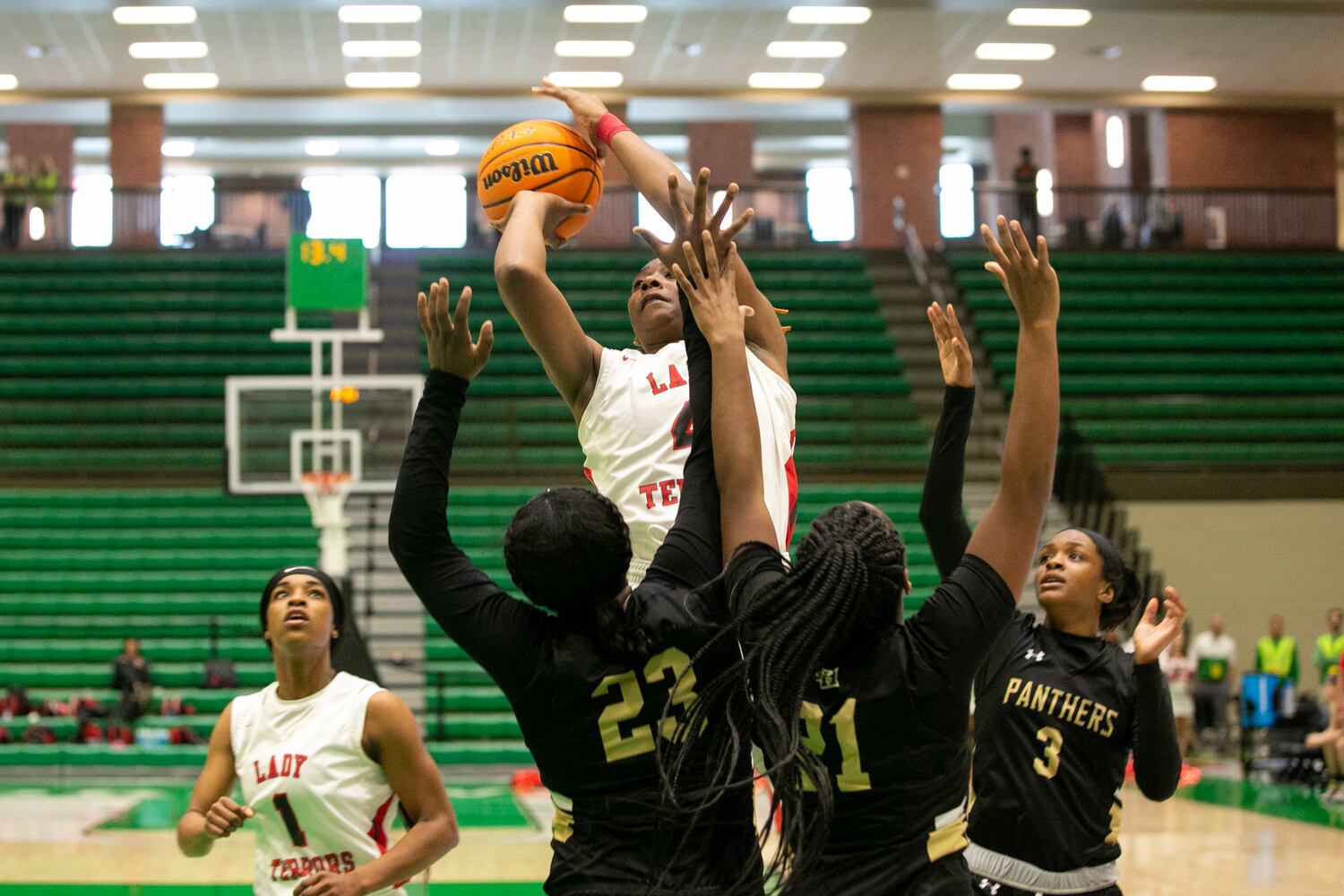 Photos: High school basketball state tourney continues