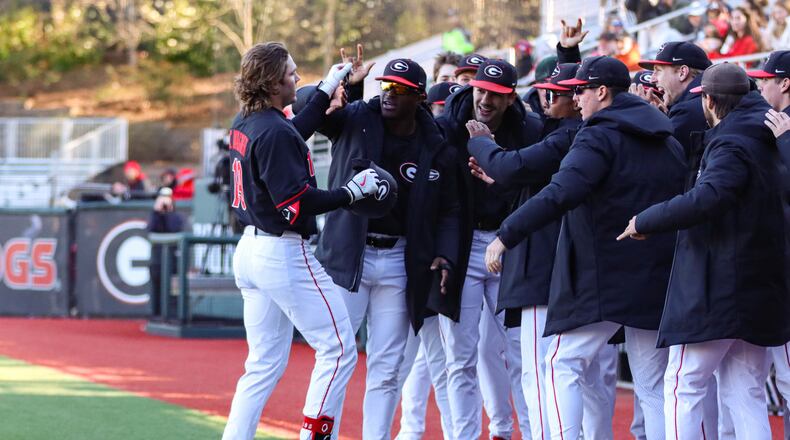 Georgia first baseman and pitcher Cole Wagner (19) is congratulated after hitting a home run during Georgia’s win over Wofford at Foley Field in Athens, Ga., on Tuesday, Mar. 14, 2023. The Bulldogs have clubbed 41 homers this season and ranked No. 10 nationally with a team batting average of .337. (Photo by Kari Hodges/UGA Athletics)