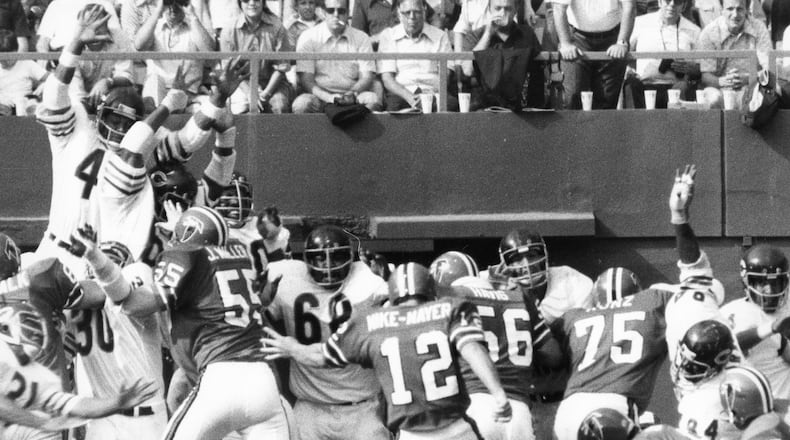 The Falcons’ Nick Mike-Mayer kicks a field goal against the Bears in the 1970s. AJC file photo