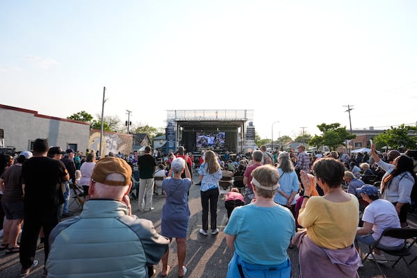People attend a concert at George Floyd Square on the five-year anniversary of Floyd's death, Sunday, May 25, 2025, in Minneapolis. (AP Photo/Abbie Parr)