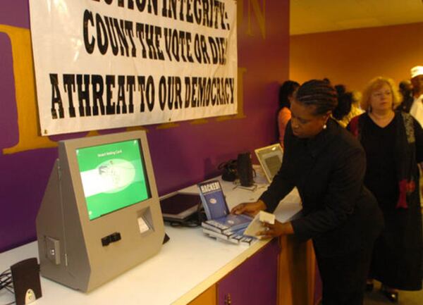 Cynthia McKinney prepares to hold a press conference on Sept. 30, 2006, in Decatur to say that voters are disenfranchised by Diebold voting machines that leave no paper trail. (FRANK NIEMEIR / AJC file photo)