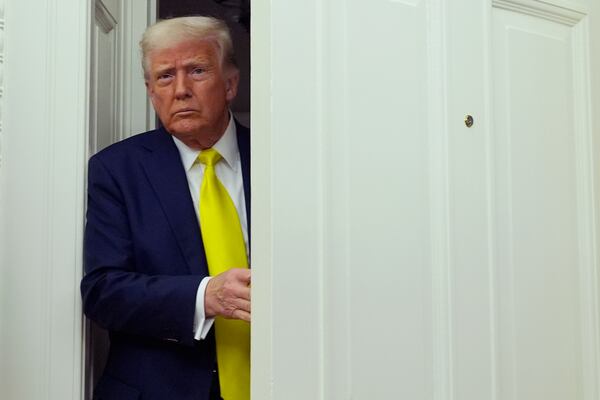 President Donald Trump arrives at a swearing in ceremony for Dr. Mehmet Oz to be Administrator of the Centers for Medicare and Medicaid Services, in the Oval Office of the White House, Friday, April 18, 2025, in Washington. (AP Photo/Alex Brandon)