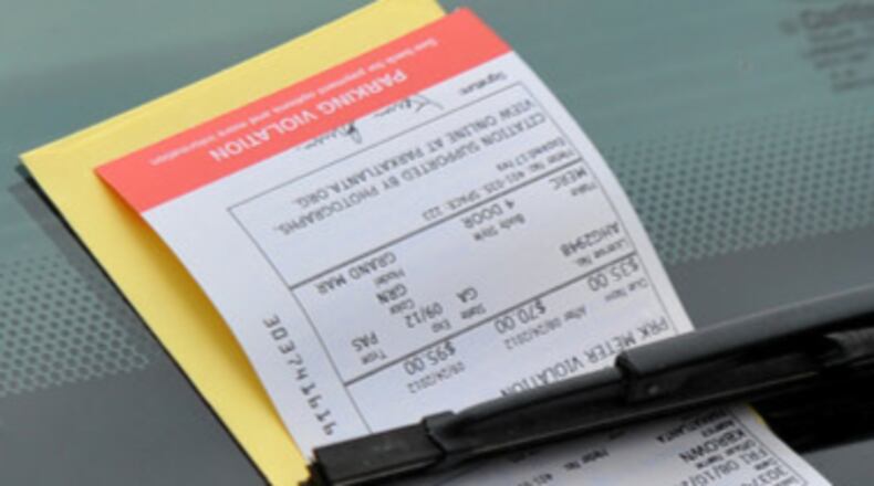 A parking ticket issued by Kevin Brown with ParkAtlanta Friday August 10, 2012. The fine is $35.00 if paid within two weeks. The cost doubles to $70.00 after two weeks and reaches $95.00 after 45 days.
