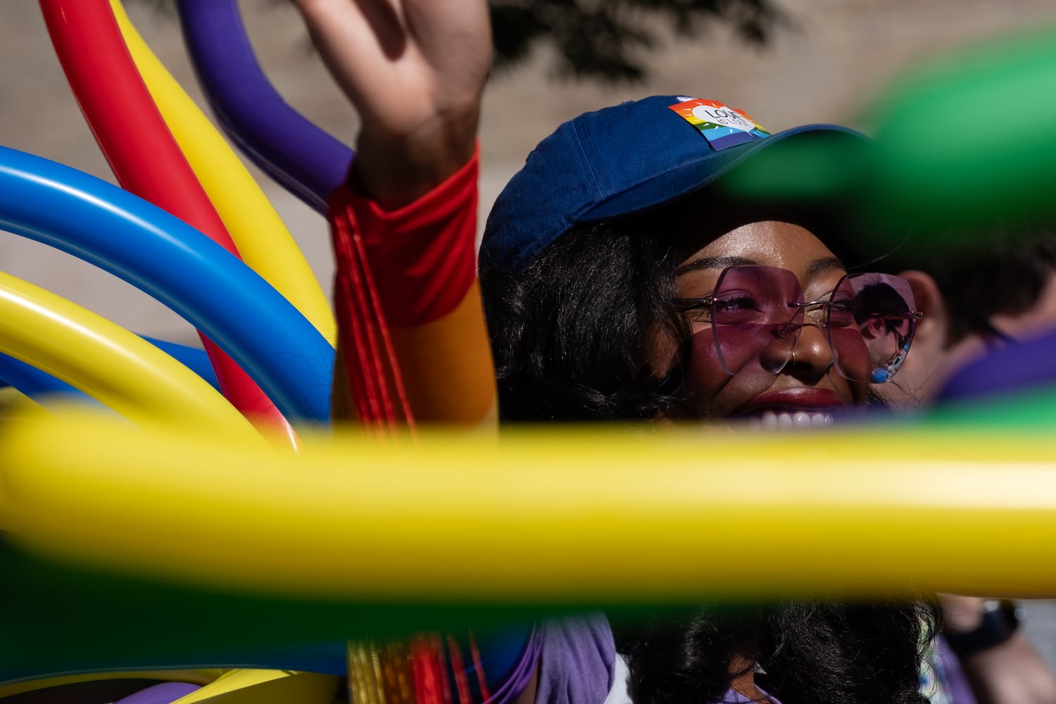 Ala Feghavo gets excited before participating in the Atlanta Pride Parade on Sunday, Oct. 12, 2025. (Ben Gray for the AJC)