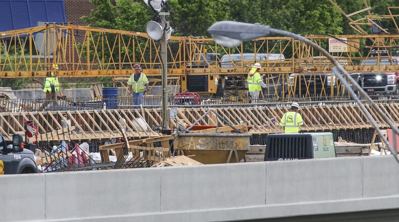 May 1, 2017 Atlanta: Work continued Monday, May 1, 2017 on the new I-85 bridge in Buckhead. Since a fire led to the collapse of a segment of I-85 in Buckhead March 30, the Georgia Department of Transportation has scrambled to reopen the vital stretch of highway into the heart of Atlanta. Contractor C.W. Matthews is rebuilding 350 feet of northbound and 350 feet of southbound lanes on I-85. JOHN SPINK/JSPINK@AJC.COM