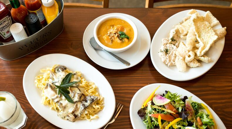 Manny's  Vegetarian Stroganoff, Sweet Potato Stew, Cracklins, Spring Salad, and Frozen Moscow Mule Slushy. Photo credit- Mia Yakel.