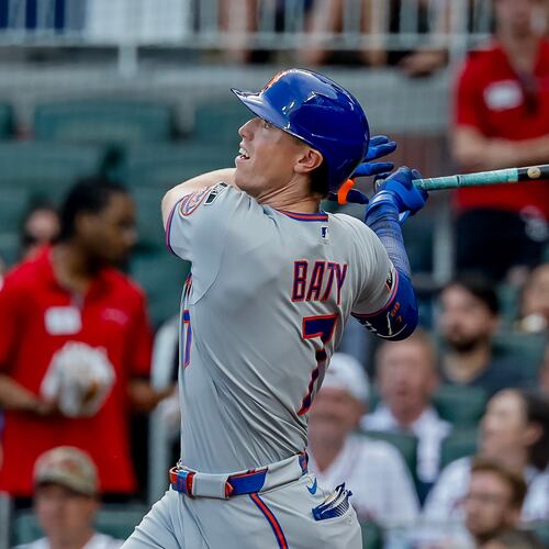 New York Mets' Brett Baty follows through on a grand slam against the Atlanta Braves during the first inning of a baseball game, Monday, Aug. 10, 2026, in Atlanta. (AP Photo/Erik S. Lesser)