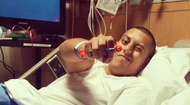 Santiago Barrera finds a way to pass time during his six-month stay at the Aflac Cancer Center. The Wheeler High School sophomore is doing well and back at school. CONTRIBUTED