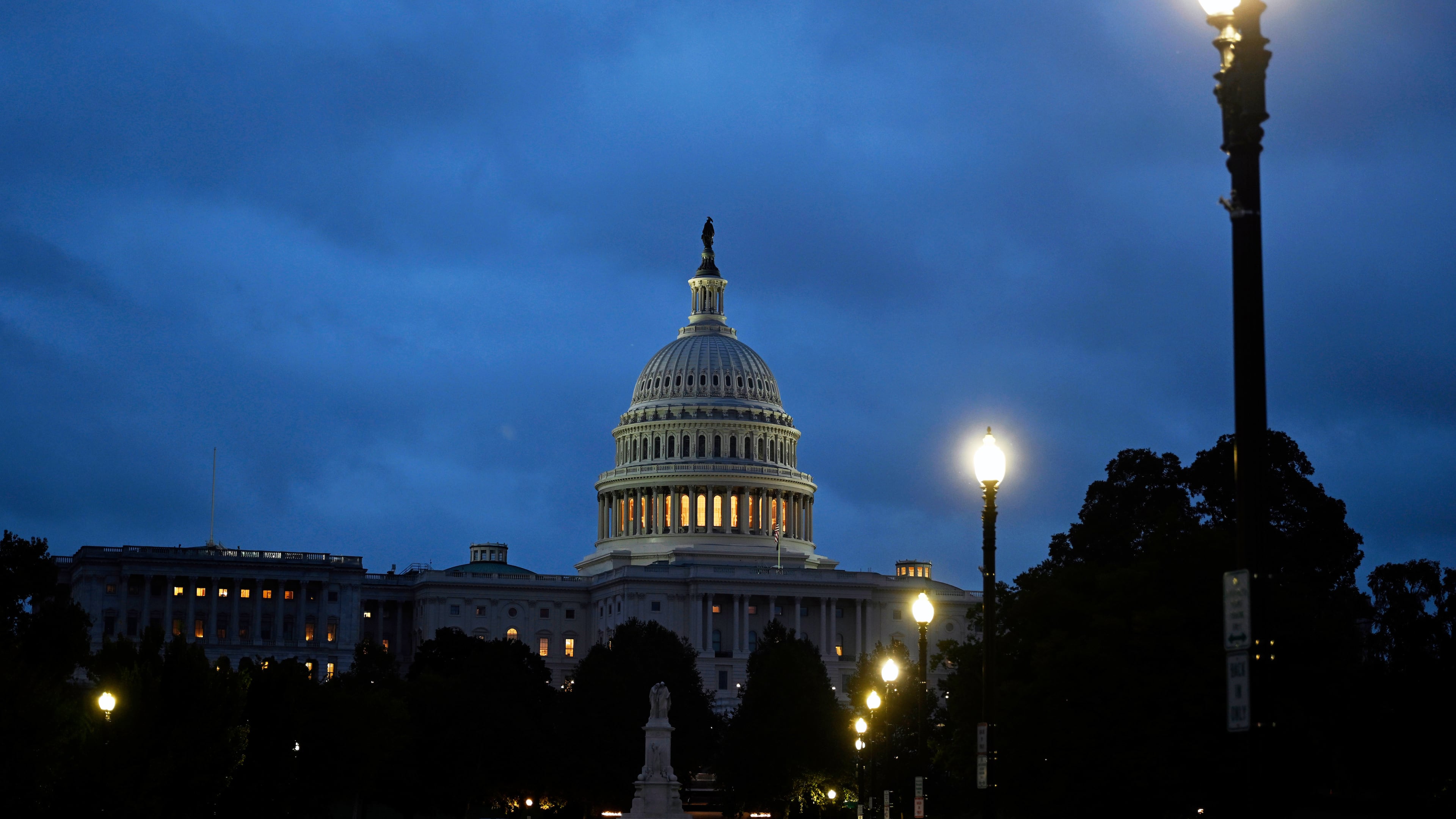 Early morning cloudy skies over the U.S. Capitol during the 8th day of the government shutdown on Wednesday, Oct. 8, 2025, in Washington. (AP Photo/John McDonnell)
