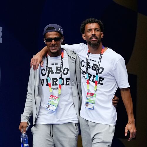 Cape Verde goalkeepers Vozinha, right, and Marcio Rosa walk onto the pitch for a team visit on the eve of their Group H World Cup match against Uruguay, in Miami Gardens, Fla., Saturday, June 20, 2026. (AP Photo/Rebecca Blackwell)
